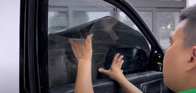 dán phim cách nhiệt ô tô có bị phạt không